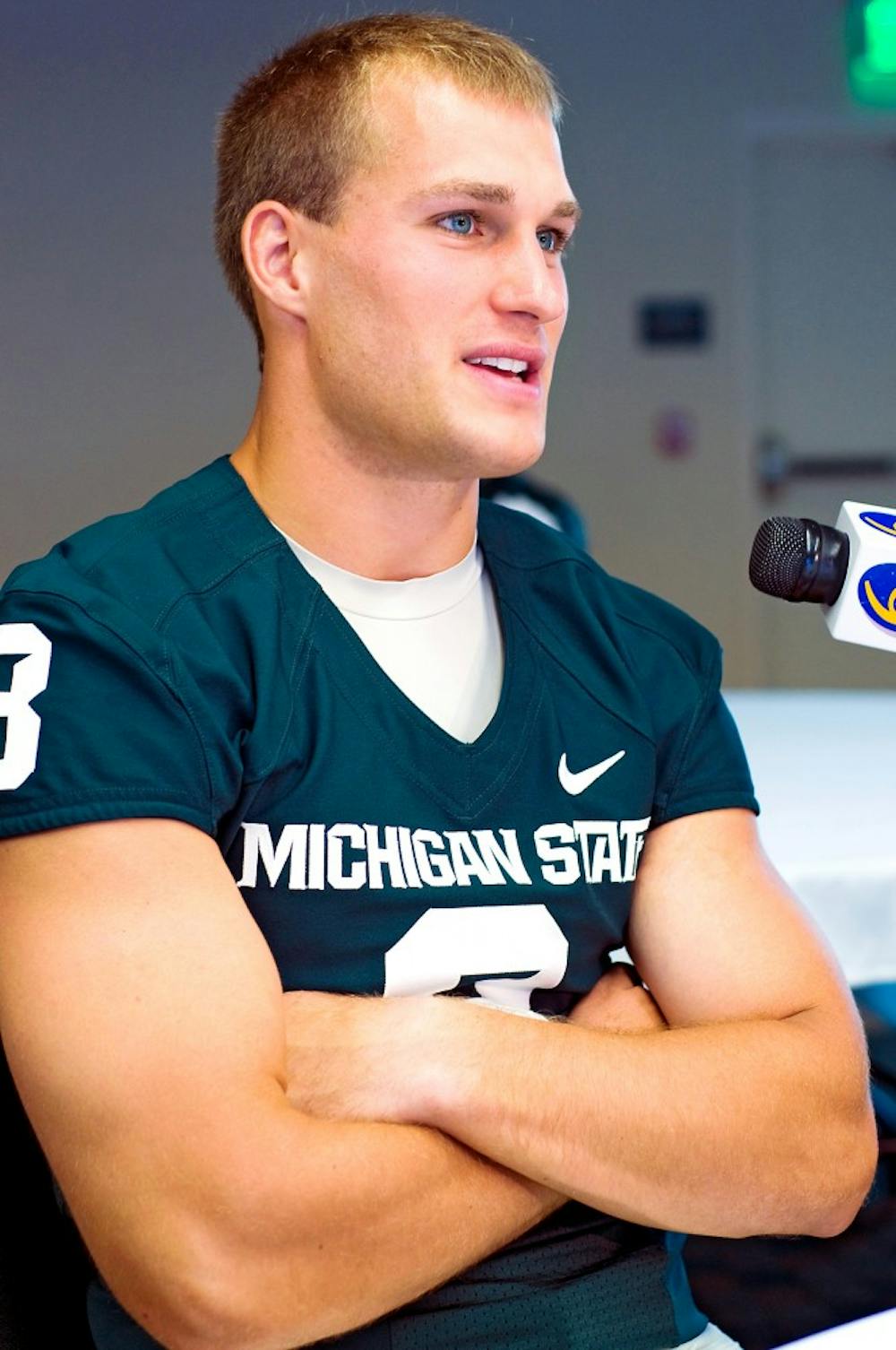 	<p>Fifth year senior quarterback Kirk Cousins sits back after the first wave of reporters are satisfied during Monday&#8217;s media day on the fourth floor of Spartan Stadium.</p>