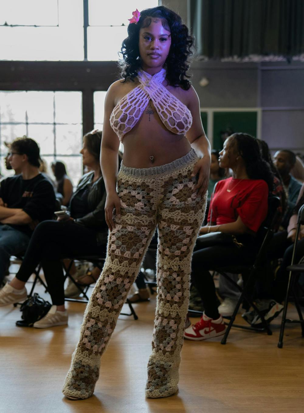 <p>A model poses in a two- piece crochet set designed by Tania Threads. This brand is owned by MSU student, Tania Dirden.</p>