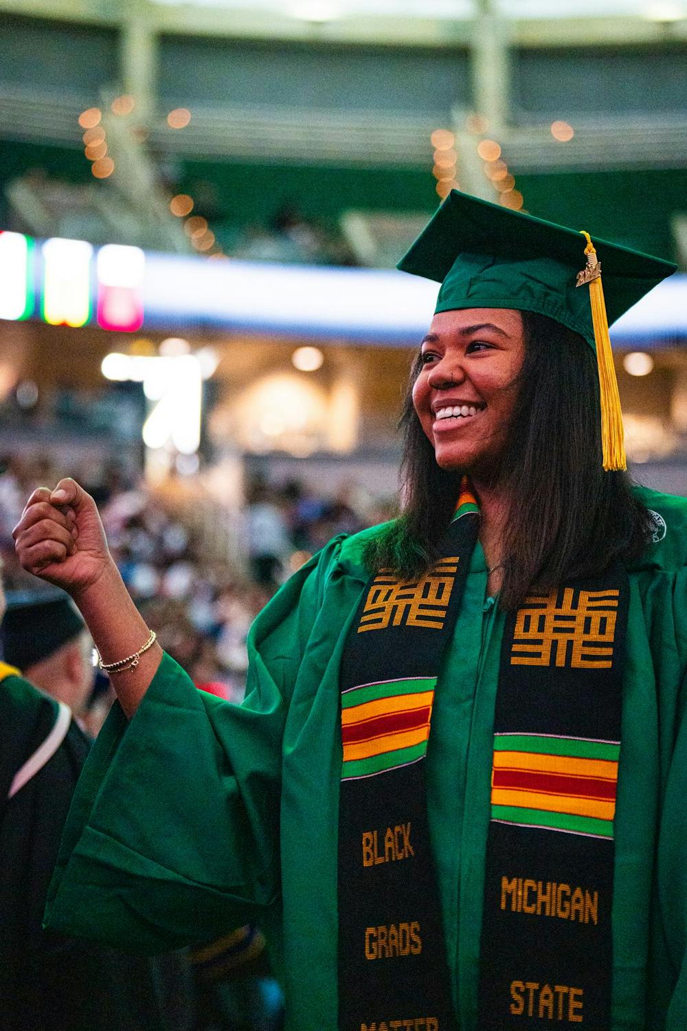 An MSU alumnus greets a former professor during the fall 2024 commencement ceremony at the Breslin Center on Dec. 14, 2024.