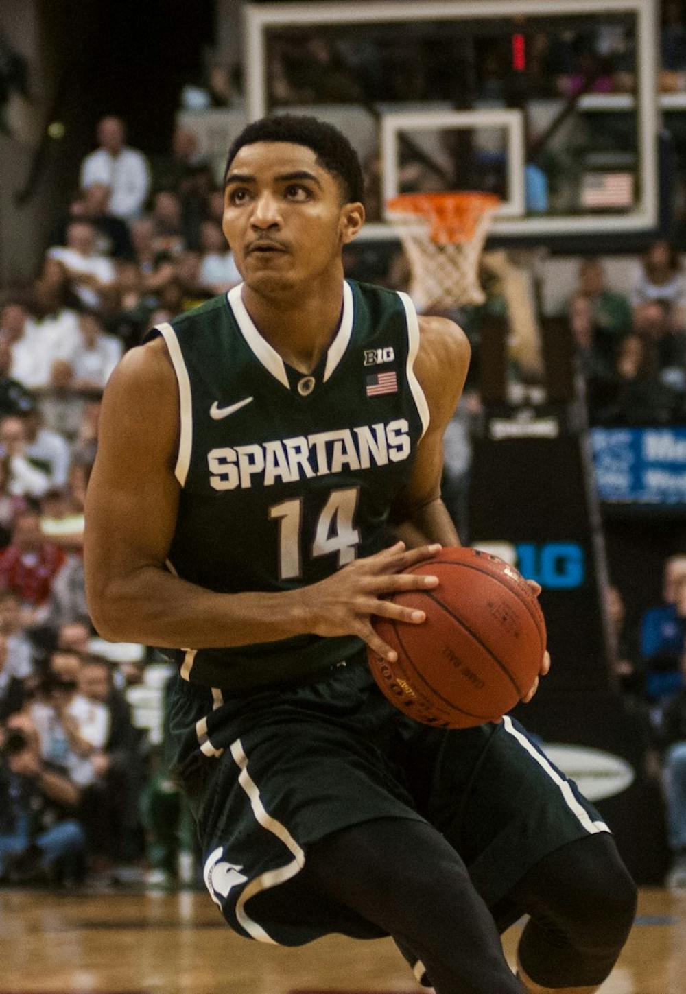 <p>Sophomore guard Gary Harris looks to shoot March 15, 2014, during a game against Wisconsin at Bankers Life Fieldhouse at the Big Ten Tournament in Indianapolis. The Spartans defeated the Badgers, 83-75. Erin Hampton/The State News</p>