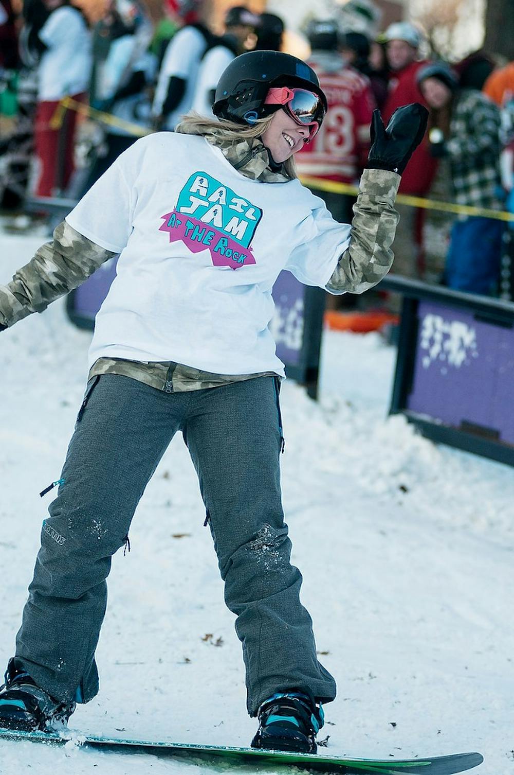 <p>Business junior Kelsey McGorisk snowboards on Nov. 21, 2014, at The Rock on Farm Lane. The Michigan State Alpine Ski and Snowboard Team and the Spartan Ski Club hosted their 2nd annual Rail Jam. Aerika Williams/The State News </p>