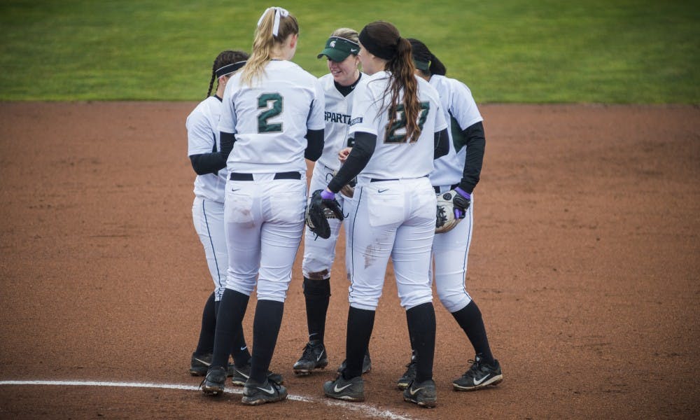 The Spartans gather to talk during the game against Maryland on March 31, 2017 at Secchia Stadium. The Spartans defeated the Terrapins, 11-3.