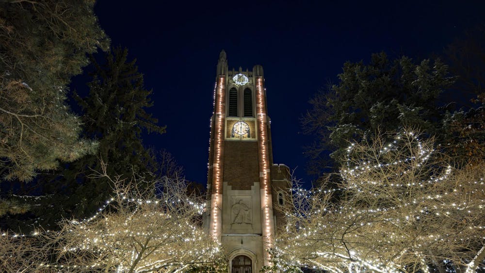 <p>Beaumont Tower is illuminated with winter lights on the Michigan State University campus in East Lansing on Monday, Dec. 8, 2025</p>