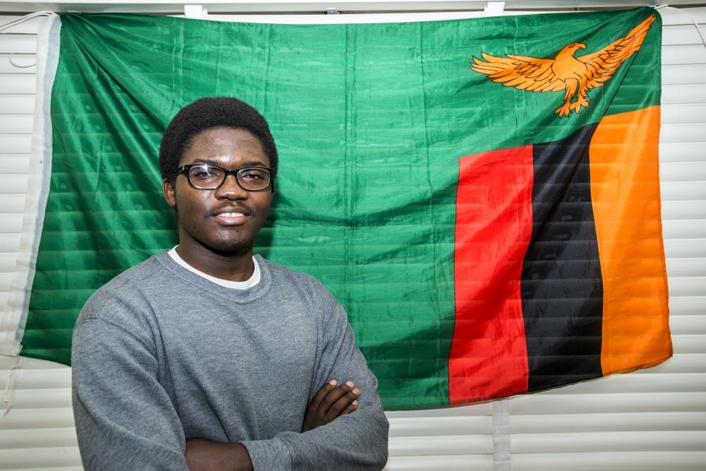 James Madison College freshman Luyando Katenda poses for a portrait on Jan. 13, 2017 in his dorm room. Katenda is an international student from Zambia and he is one of 101 MasterCard Foundation Scholars at MSU. He said after finishing his studies he would like to work as a diplomat and one day become involved in politics.