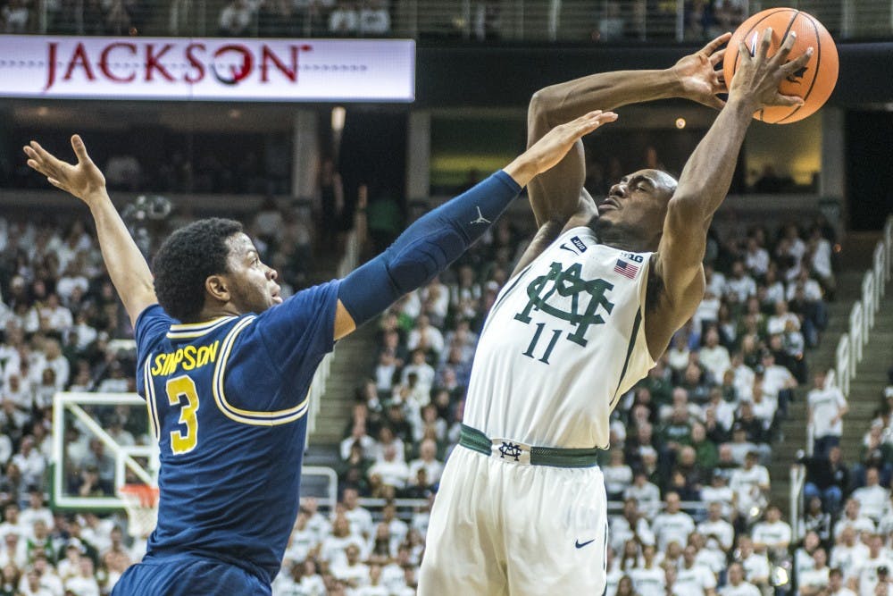 Senior guard Lourawls Nairn Jr. (11) shoots the ball during the men's basketball game against Michigan on Jan. 13, 2018 at Breslin Center. The Spartans were defeated by the Wolverines, 82-72. (Nic Antaya | The State News)