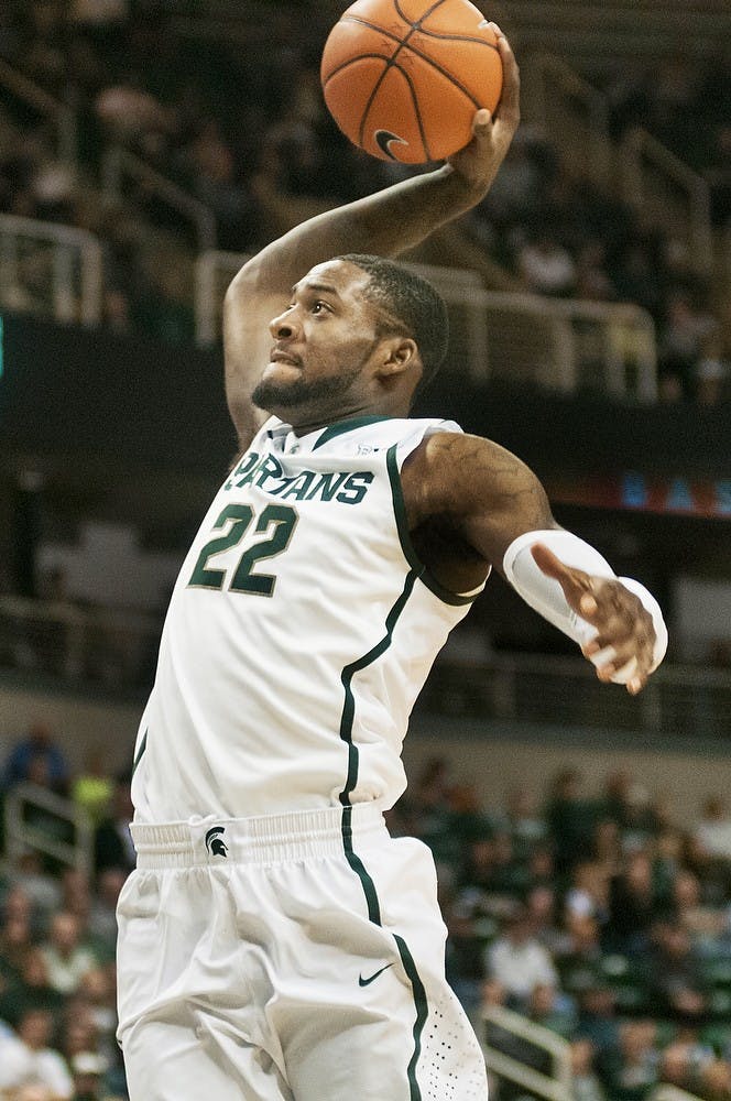 	<p>Junior guard/forward Branden Dawson goes to dunk the ball during the game against Indiana University of Pennsylvania, Nov. 4, 2013, at Breslin Center. The Spartans won, 83-45. Danyelle Morrow/The State News</p>