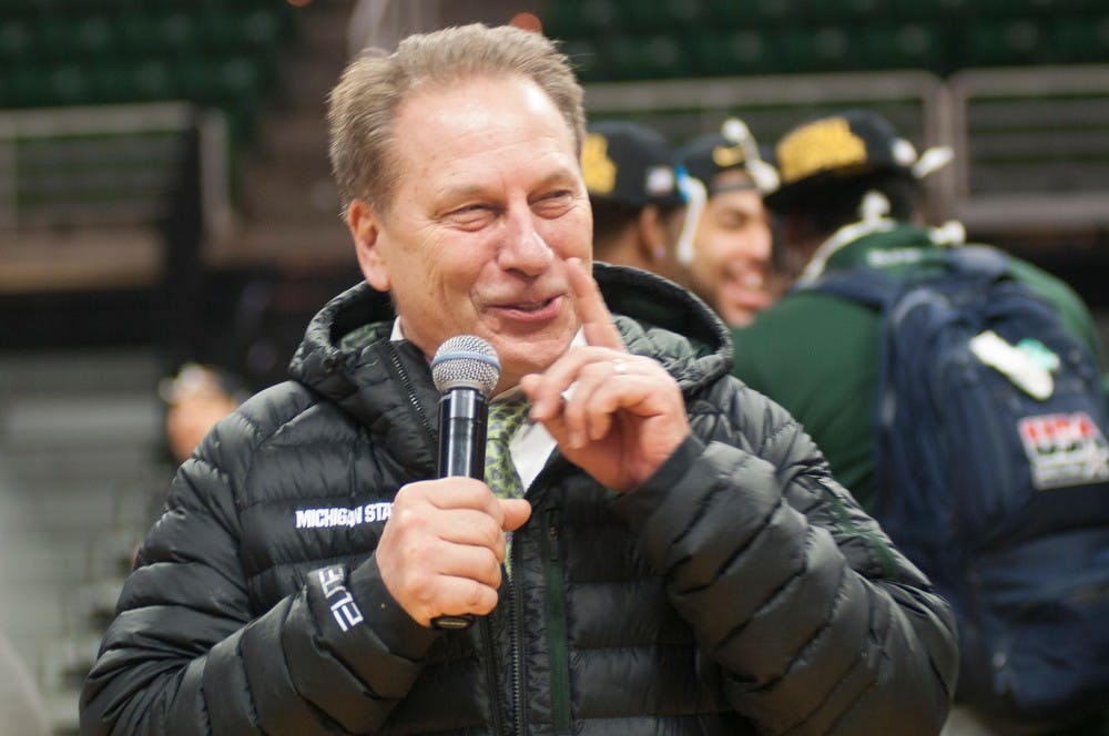 <p>Head coach Tom Izzo quiets the crowd March 29, 2015, at Breslin Center during a celebration of MSU's win over Louisville. The win advanced the team to the Final Four in Indianapolis, Indiana. Kennedy Thatch/The State News</p>