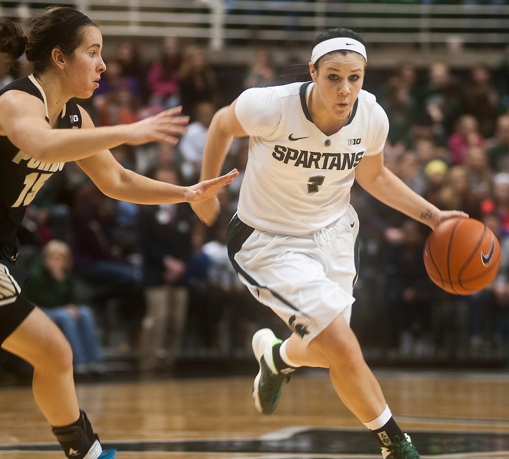 	<p>Freshman guard Tori Jankoska charges down the court past Purdue senior guard Courtney Moses Feb. 2, 2014 during a game against Purdue at Breslin Center. The Spartans defeated the Boilermakers, 89-73 . Erin Hampton/The State News</p>