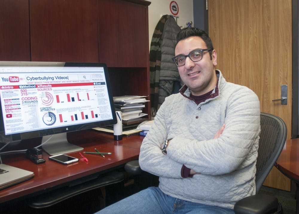 Advertising professor Saleem Alhabash poses for a portrait in his office on Feb. 1, 2017 at Communication Arts and Sciences Building.