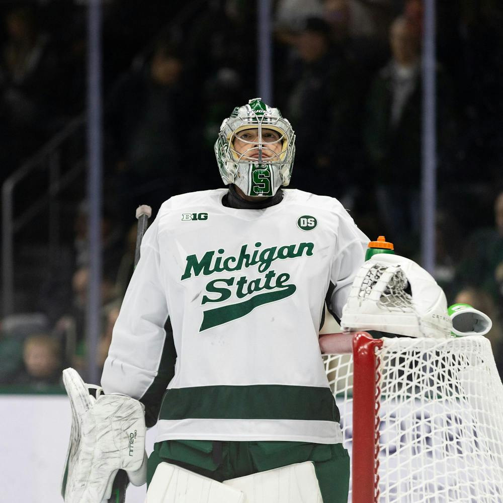 <p>MSU Jr. G, Trey Augustine (1), looks up to the crowd in Munn Ice Arena in East Lansing, MI on Jan. 23, 2026.</p>