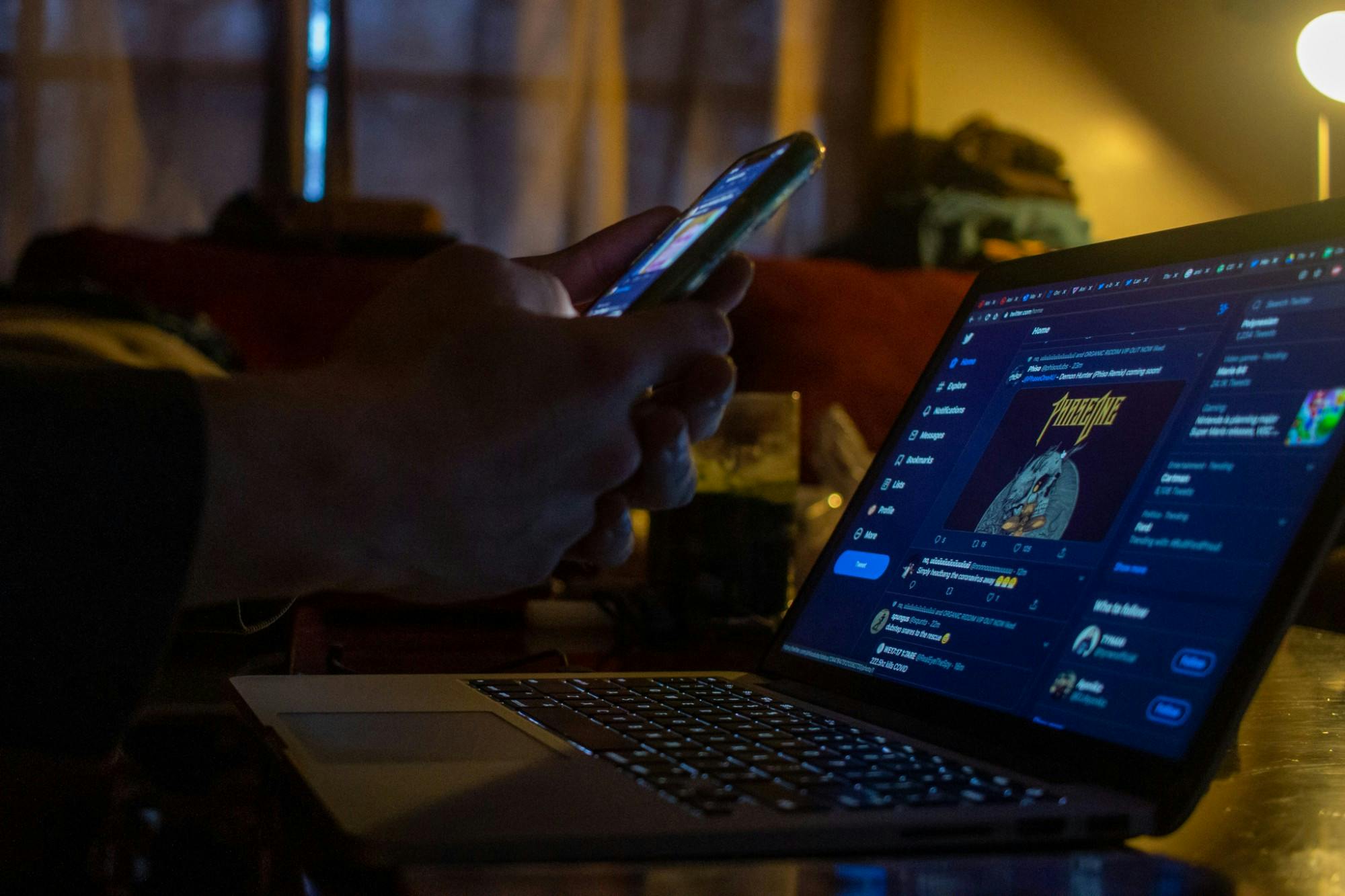 An MSU student checks social media during the Coronavirus stay-in-place quarantine on March 30, 2020.