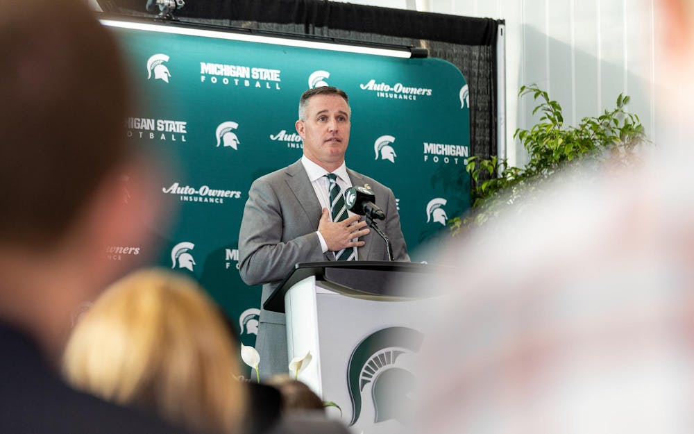 MSU's new football HC Pat Fitzgerald answers a question from the crowd in the Tom Izzo football building in East Lansing, MI on Dec. 2, 2025.