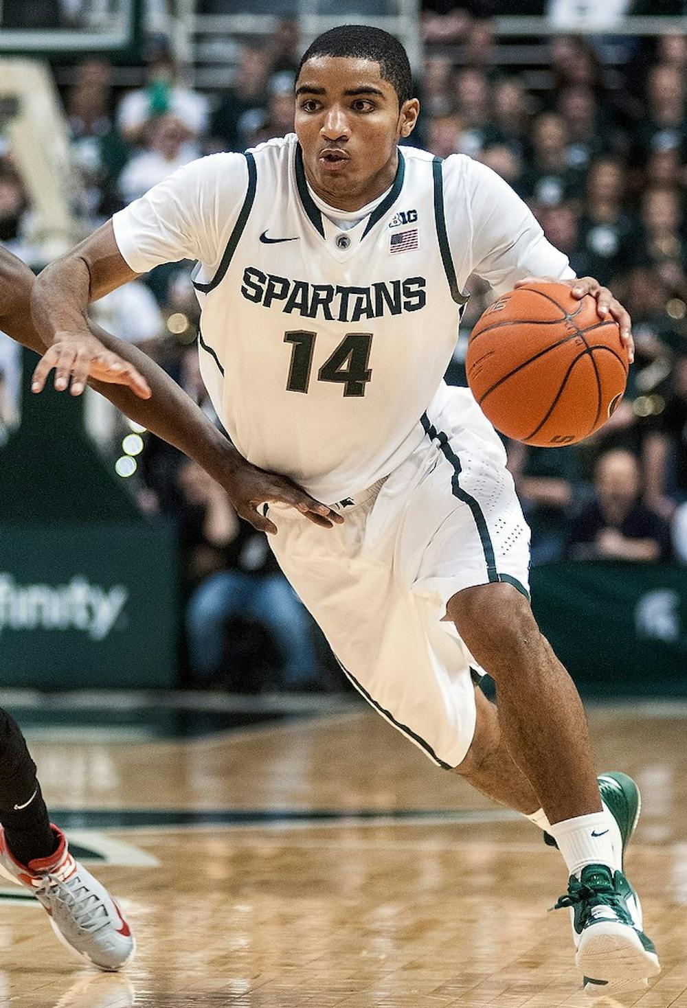 	<p>Freshman guard Gary Harris drives the ball down low Saturday, Jan. 19, 2013, at Breslin Center. The Spartans defeated Ohio State 59-56, improving <span class="caps">MSU</span>&#8217;s record to 5-1 in the Big Ten. Adam Toolin/The State News</p>