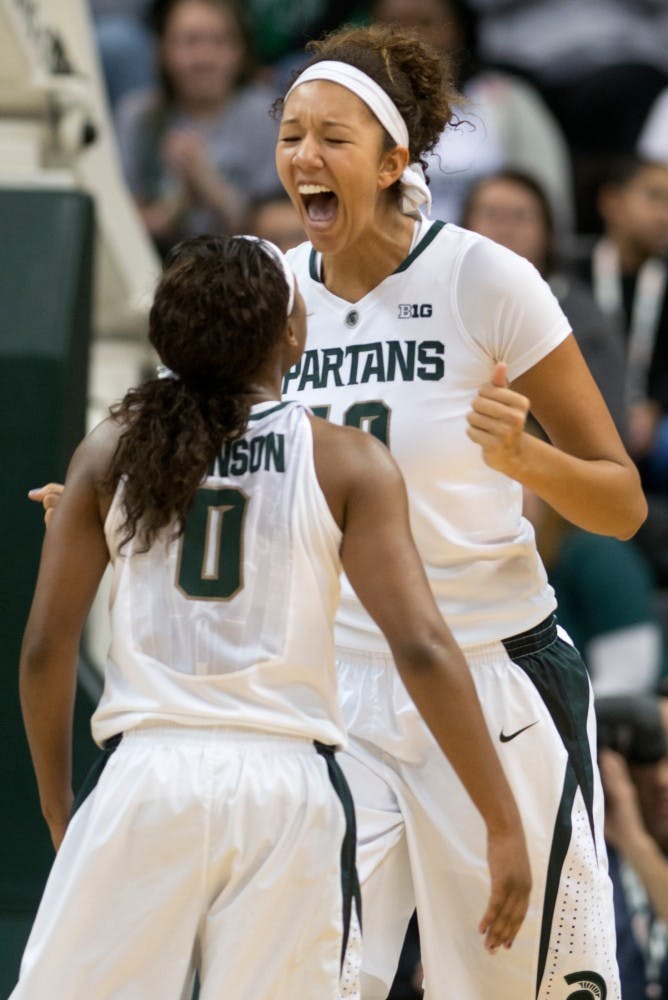 	<p>Junior center Madison Williams celebrates blocking a Penn State pass Jan. 19, 2014, at Breslin Center.  Julia Nagy/The State News </p>