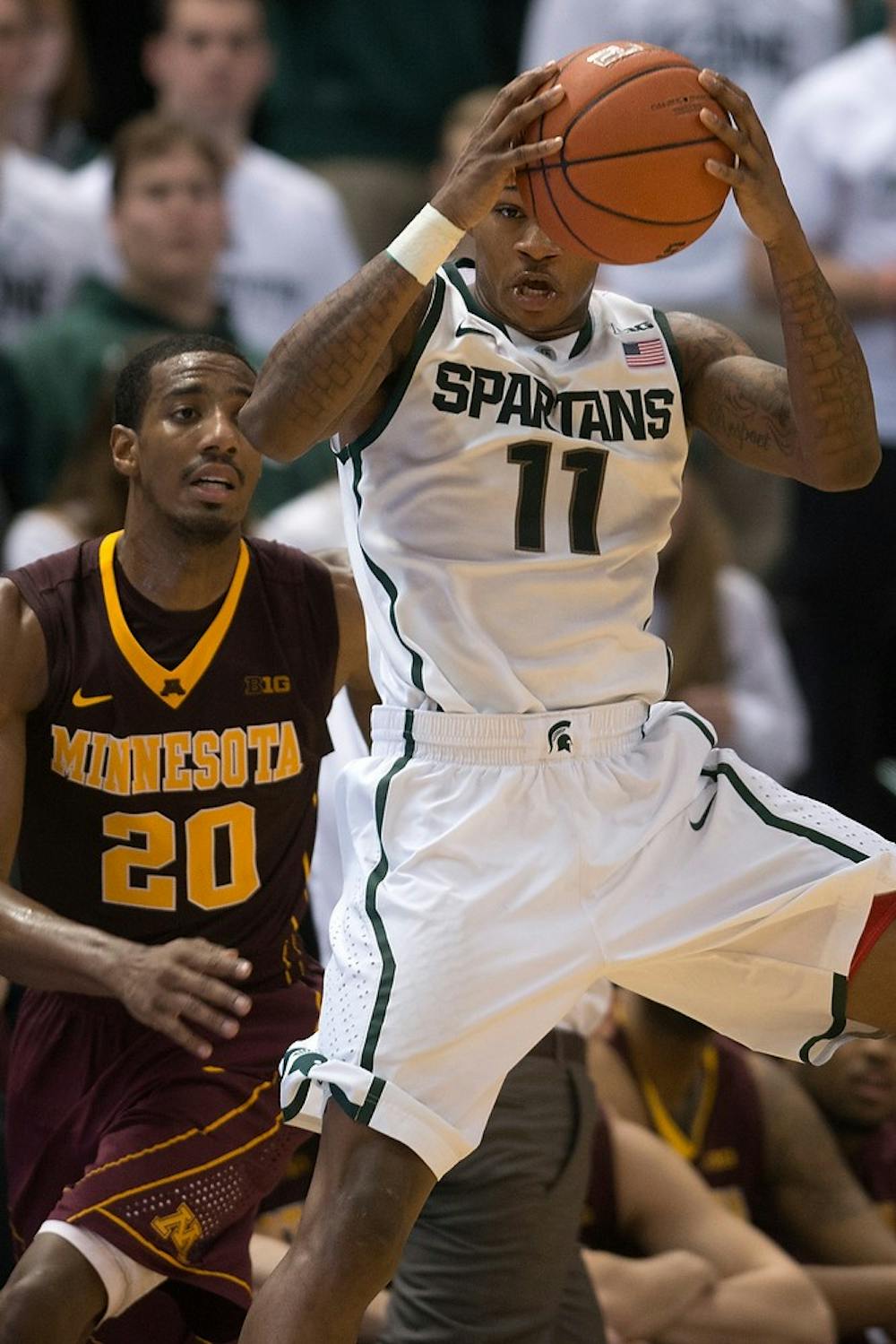 	<p>Senior guard Keith Appling catches a rebound on Jan. 11, 2014, at Breslin Center during the game against Minnesota. The Spartans defeated the Gophers in overtime, 87-75. Julia Nagy/The State News</p>