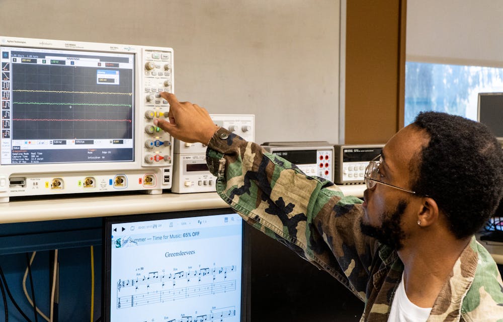 <p>Computer engineering senior Timothy Boyd plays music on computers in a lab at Michigan State University&#x27;s College of Engineering on Sept. 21, 2022. </p>