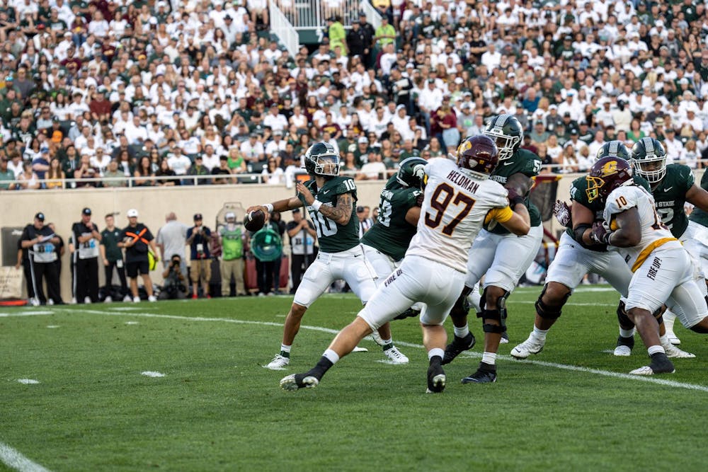<p>Redshirt fourth-year quarterback Noah Kim (10) was well defended during Michigan State's home opener against Central Michigan University at Spartan Stadium on Sept. 1, 2023. Michigan State would go on to win 31-7</p>