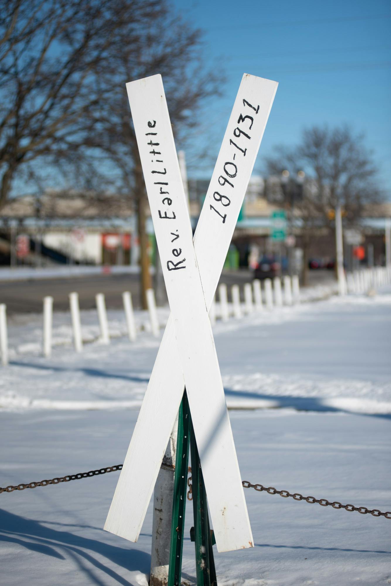 A memorial on the corner of Michigan Avenue and Detroit Street commemorates Rev. Earl Little. Jan. 29, 2021.