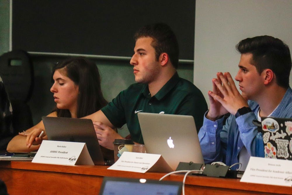 ASMSU President Mario Kakos listens at the ASMSU meeting on Oct. 3, 2019.