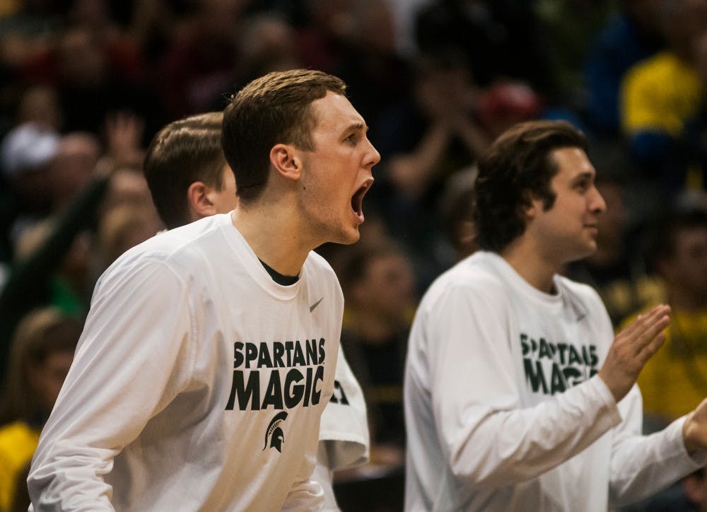 <p>Sophomore forward Colby Wollenman yells out to his teammates March 15, 2014, during a game against Wisconsin at Bankers Life Fieldhouse at the Big Ten Tournament in Indianapolis. The Spartans defeated the Badgers, 83-75. Erin Hampton/The State News</p>