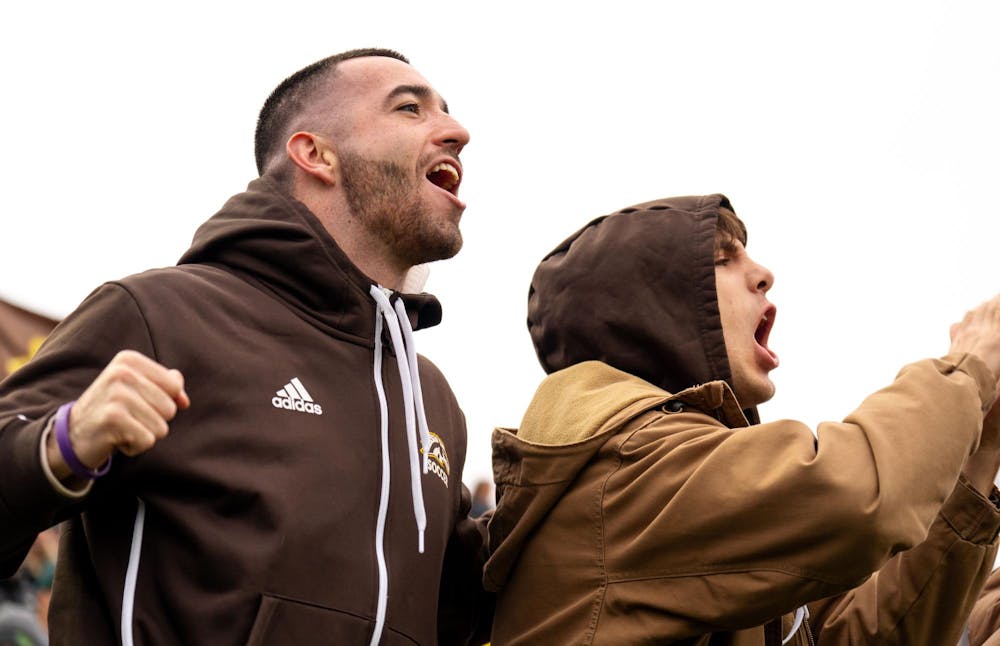 <p>Western Michigan University fans cheer as their team scored during the NCAA soccer tournament game between MSU and WMU on Nov. 16, 2024. The Spartans defeated the Broncos, 3-1.</p>