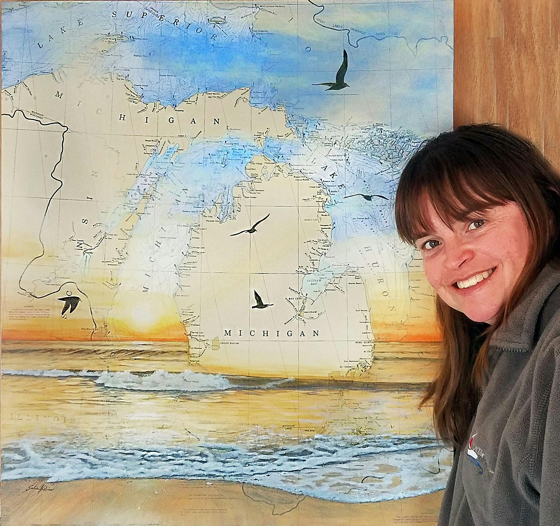 <p>Salina Kalnins is a Michigan-based artist who specializes in nautical chart art. Before it moved online, this would have been her first year at the East Lansing Art Festival. PHOTO COURTESY OF KALNINS</p>