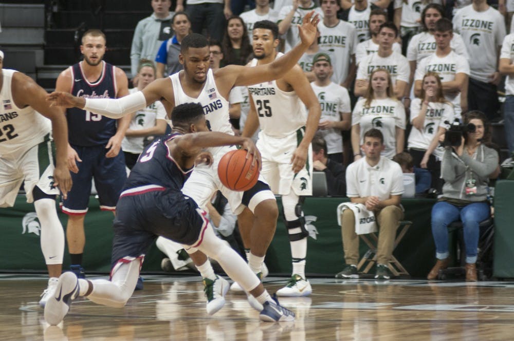 Senior guard Alvin Ellis III (3) blocks senior guard Garrett Hall (5) during the game against Saginaw Valley State University on Nov. 2, 2016 at the Breslin Center. The Spartans defeated the Cardinals 87-77.