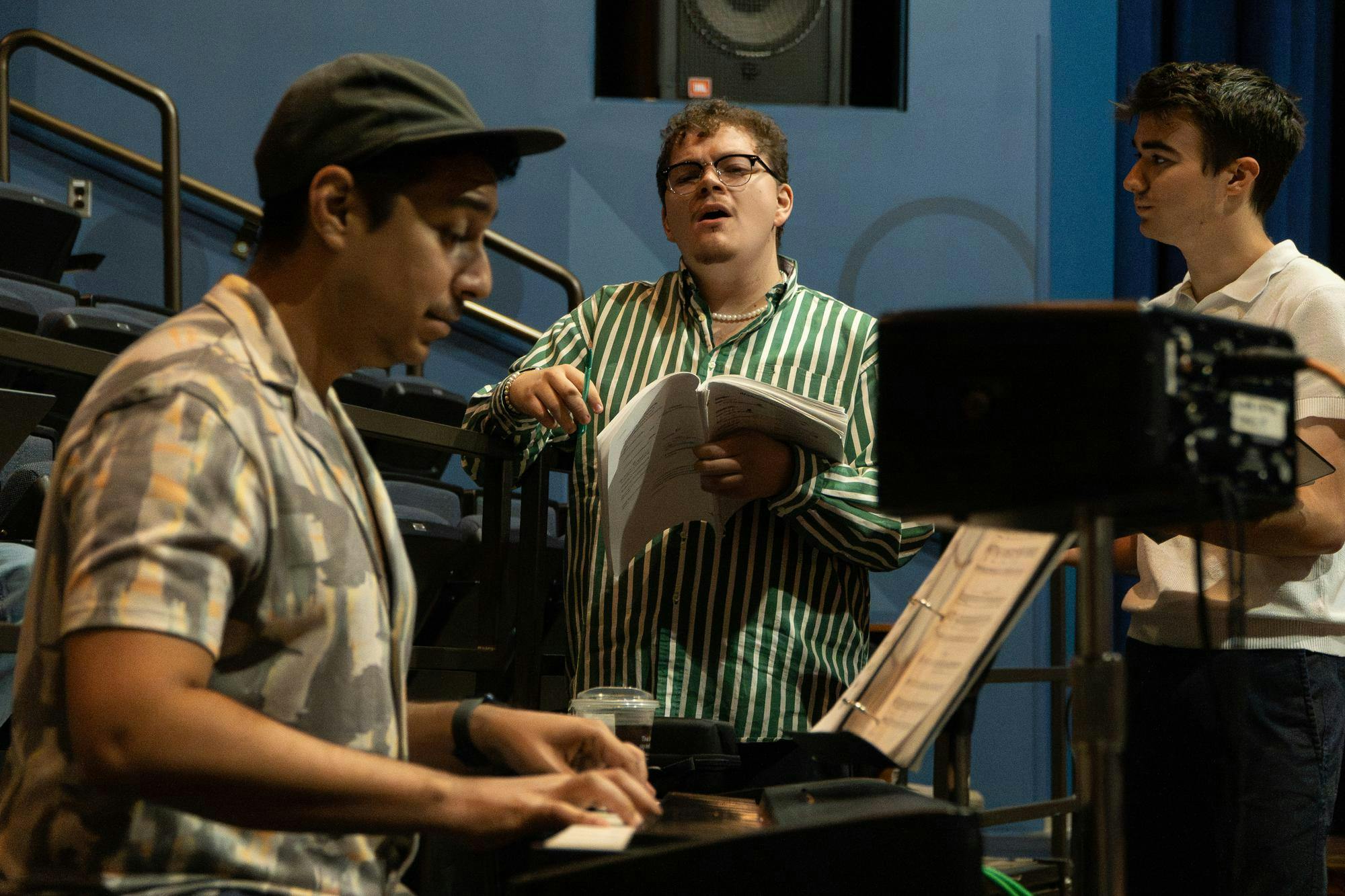 Cast members Tyler Pintea and Oliver Angel rehearse the song “Great, Cool” from the musical “In Pieces.” The rehearsal took place alongside the writer, Joey Contreras, in the Pasant Theatre on Sept. 17, 2024.