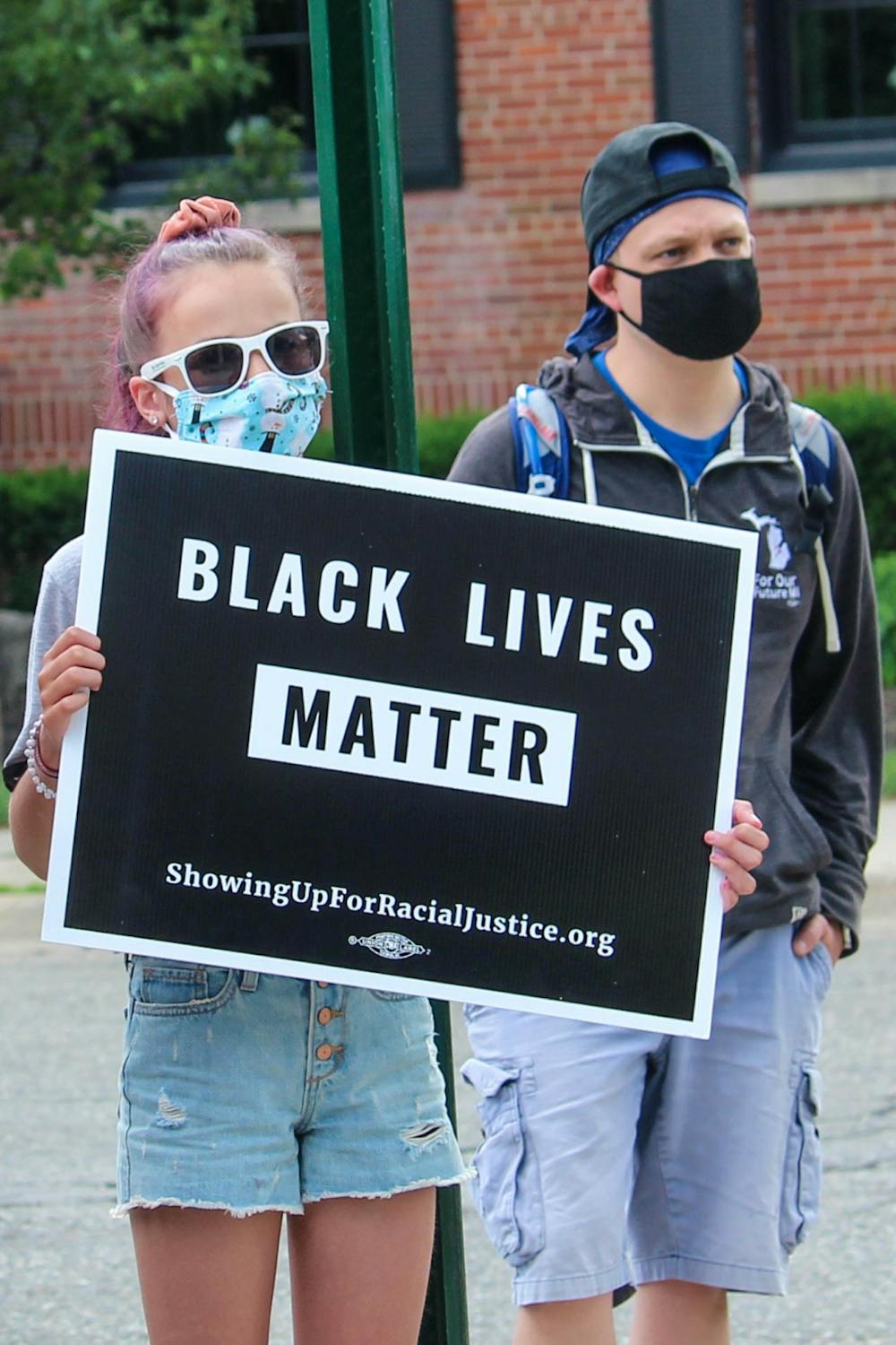 <p>Protesters show their support for Black Lives Matter at March Against Fear on June 24, 2020.</p>