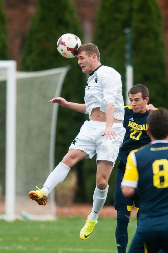 	<p>Junior forward Tim Kreutz heads the ball during the game against Michigan on Nov. 9, 2013, at DeMartin Stadium at Old College Field. The Spartans defeated the Wolverines, 2-0. Danyelle Morrow/The State News</p>