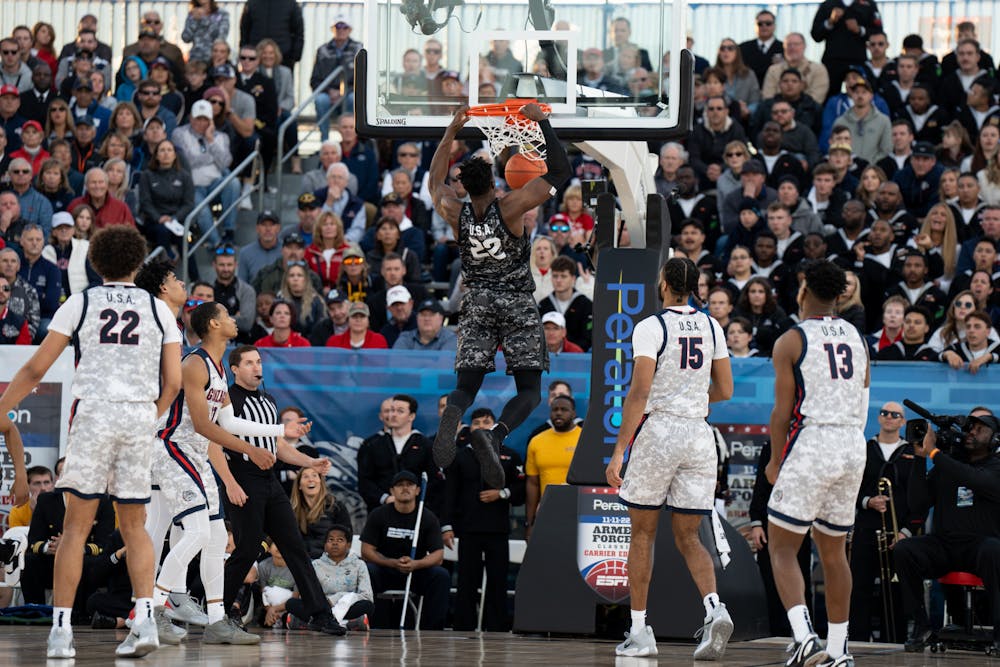 Junior center Mady Sissoko throws down a dunk during the Spartans matchup with No. 2 Gonzaga in the 2022 Armed Forces Classic on Nov. 11. The Spartans fell 64-63.