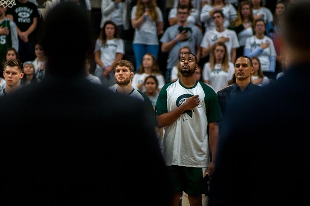 Junior forward Nick Ward (44) looks up during the National Anthem before the game against Tenessee Tech on Nov. 18, 2018 at the Breslin Center. The Spartans beat the Golden Eagles, 101-33.