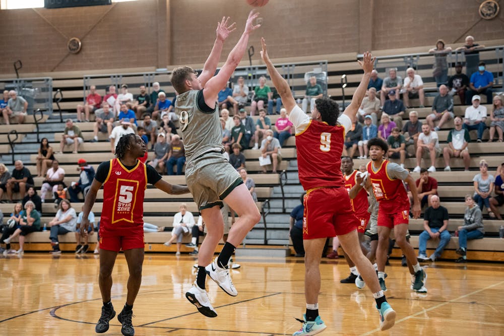<p>Incoming Michigan State freshman center Jaxon Kohler shoots a fadeaway during the Moneyball Pro-Am at Holt High School on July 12, 2022.</p>