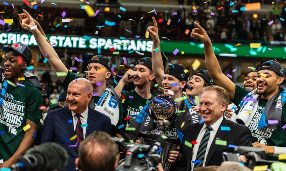 <p>Coach Tom Izzo smiles as the Spartans celebrate winning the Big 10 Championship. The Spartans beat the Wolverines, 65-60, at the United Center on March 17, 2019.</p>