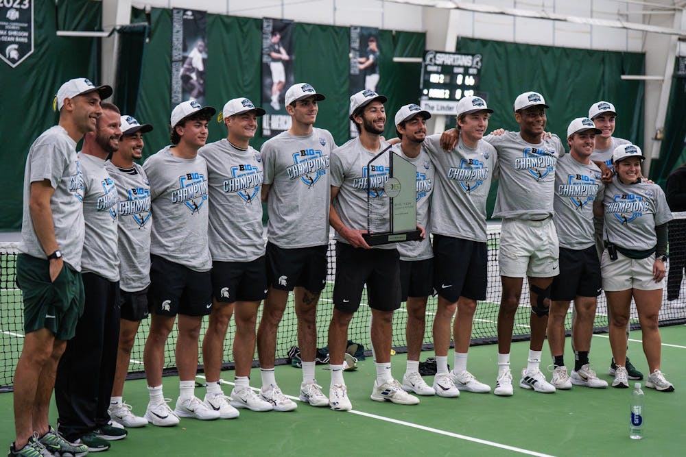<p>Michigan State men’s tennis players accept the Big Ten Conference Title Trophy at the MSU Tennis Center in Lansing, Mich. on Sunday, April 19, 2026.</p>
