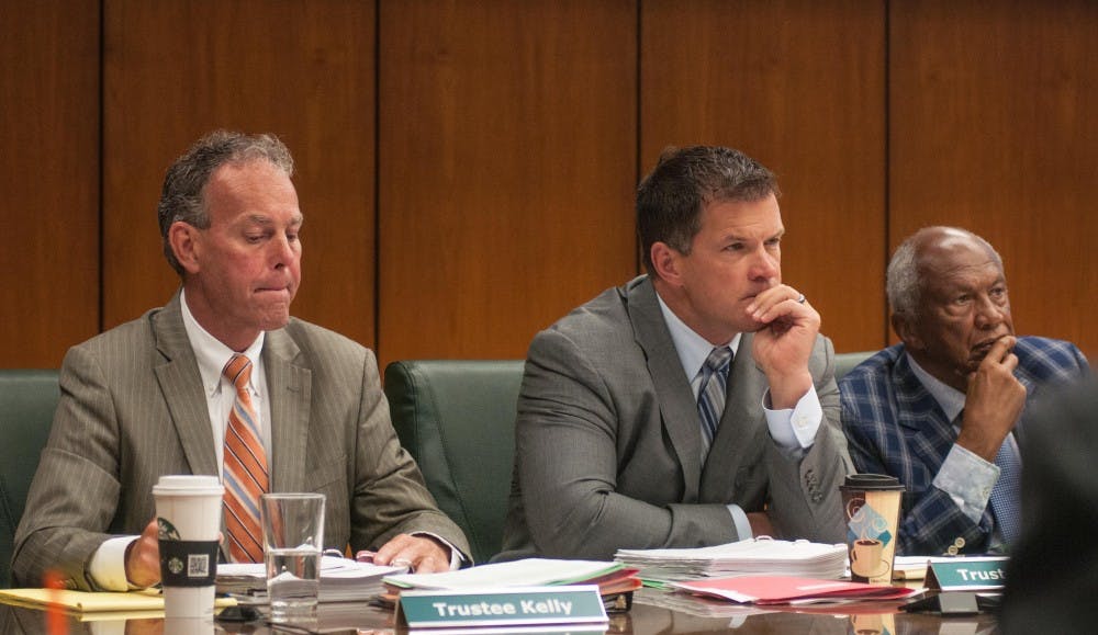 Left to right, trustees Dan Kelly, Mitch Lyons and Vice Chairman Joel Ferguson listen at the Action Meeting of Board of Trustees at the Hannah Administration Building on June 22, 2018.