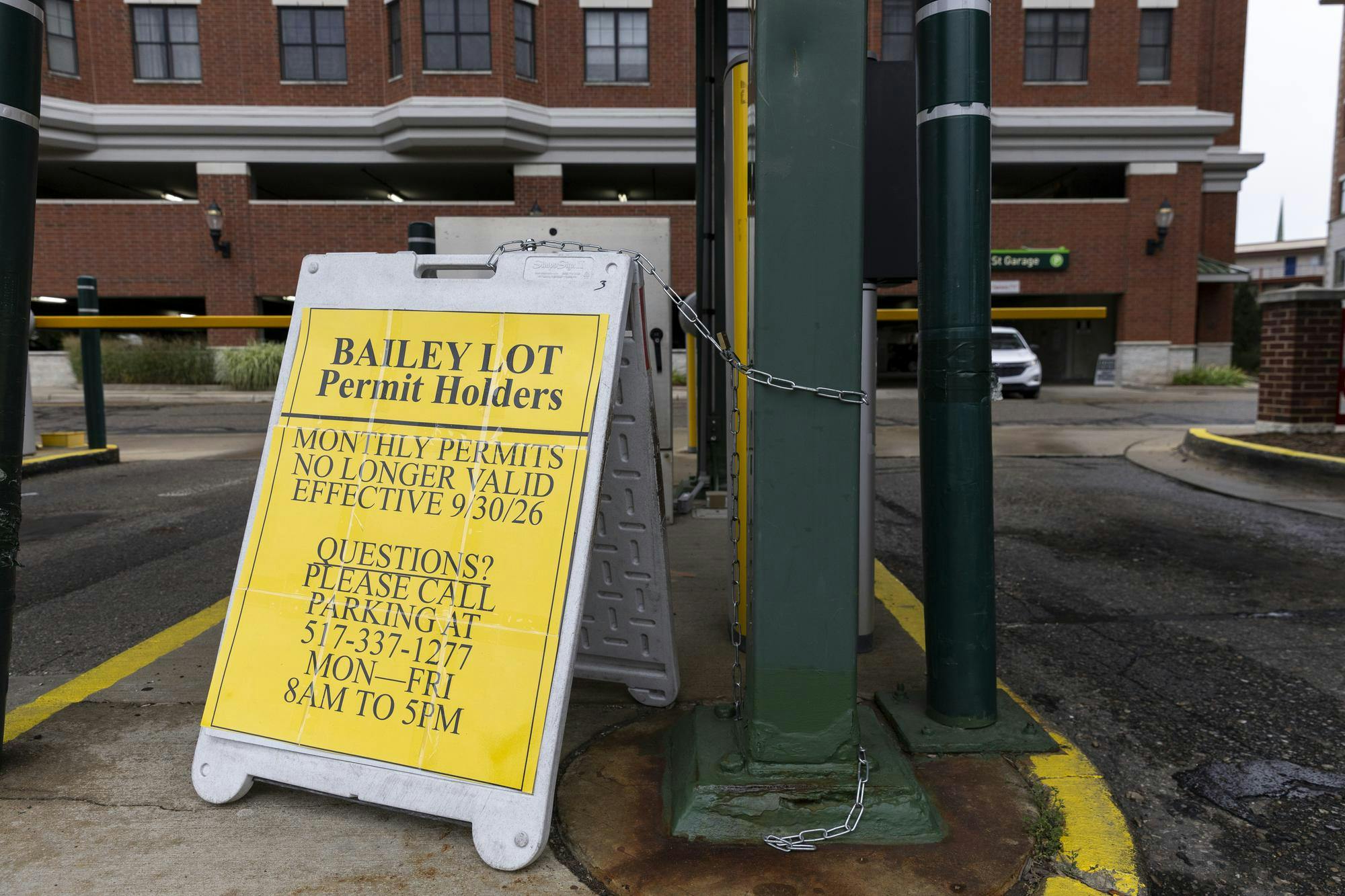 <p>A sign notifying drivers of changes to their permits for the parking lot on Bailey St in East Lansing, Mich., on Wednesday, Sept. 17, 2026.</p>