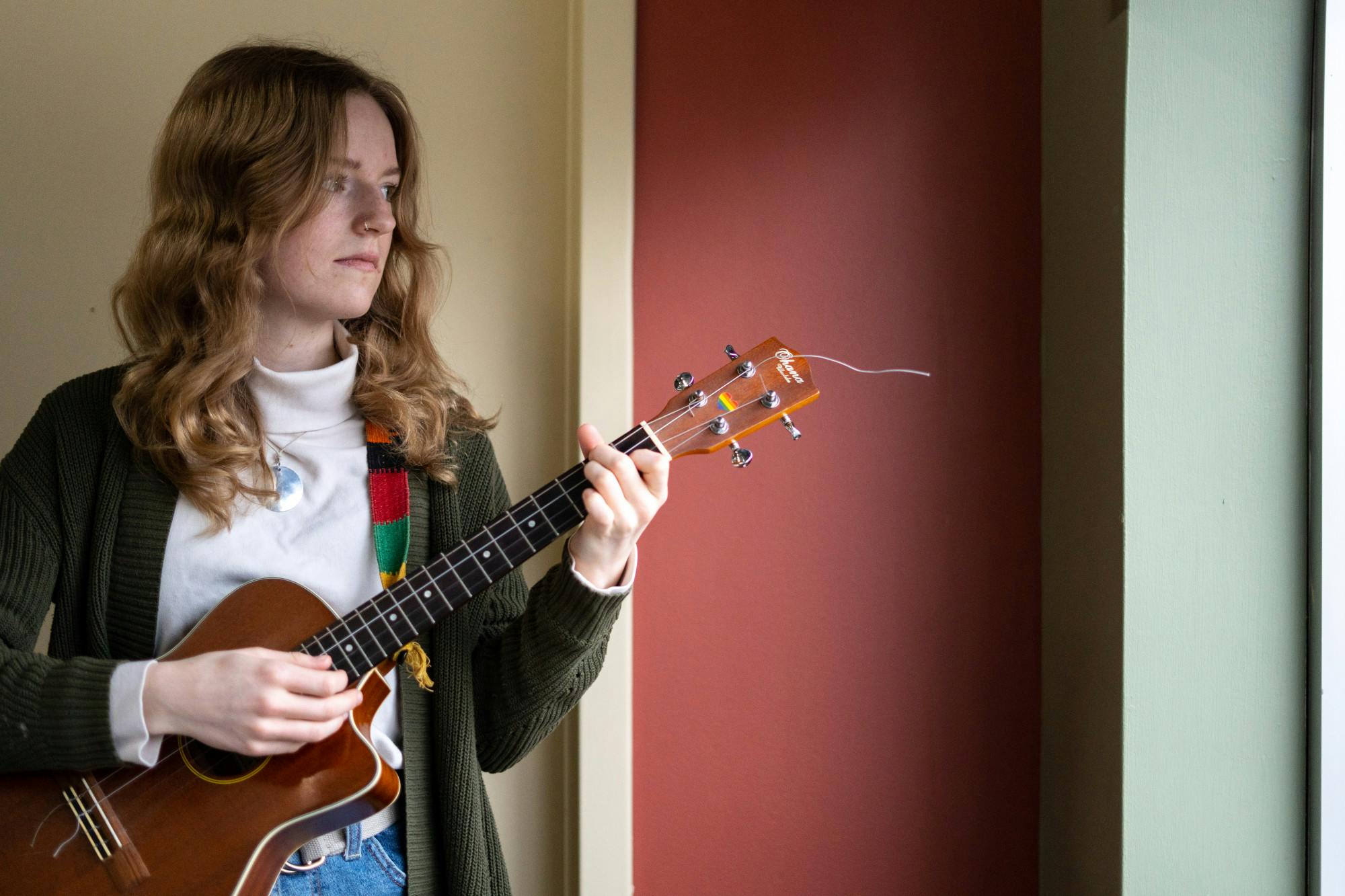 <p>Social science education freshman Jacinta Henry performs a song she wrote in The State News&#x27; newsroom on March 1, 2023. After writing the song, she performed it at the Michigan State Capitol on Feb. 20, during a protest following the mass shooting at Michigan State University.</p>