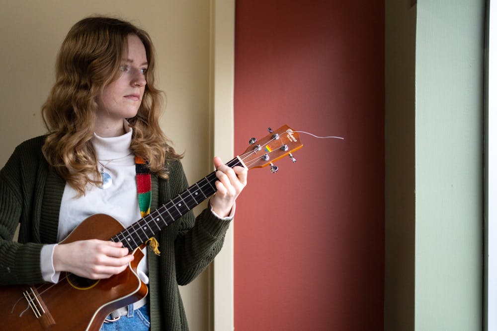 <p>Social science education freshman Jacinta Henry performs a song she wrote in The State News&#x27; newsroom on March 1, 2023. After writing the song, she performed it at the Michigan State Capitol on Feb. 20, during a protest following the mass shooting at Michigan State University.</p>