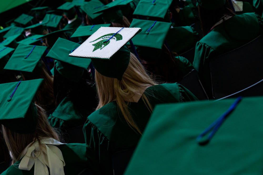 Students sit during the Michigan State University College of Communication Arts and Sciences graduation ceremony at the Breslin Student Events Center on Michigan State University’s campus in East Lansing, Mich., on Friday, May 1, 2026.