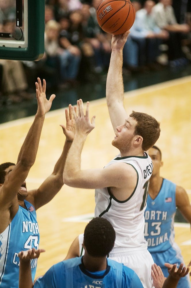 	<p>Sophomore forward Matt Costello goes up for a shot during the game against North Carolina on Dec. 4, 2013, at Breslin Center.The Spartans are tied with the Tar Heels at the half, 32-32. Danyelle Morrow/The State News</p>