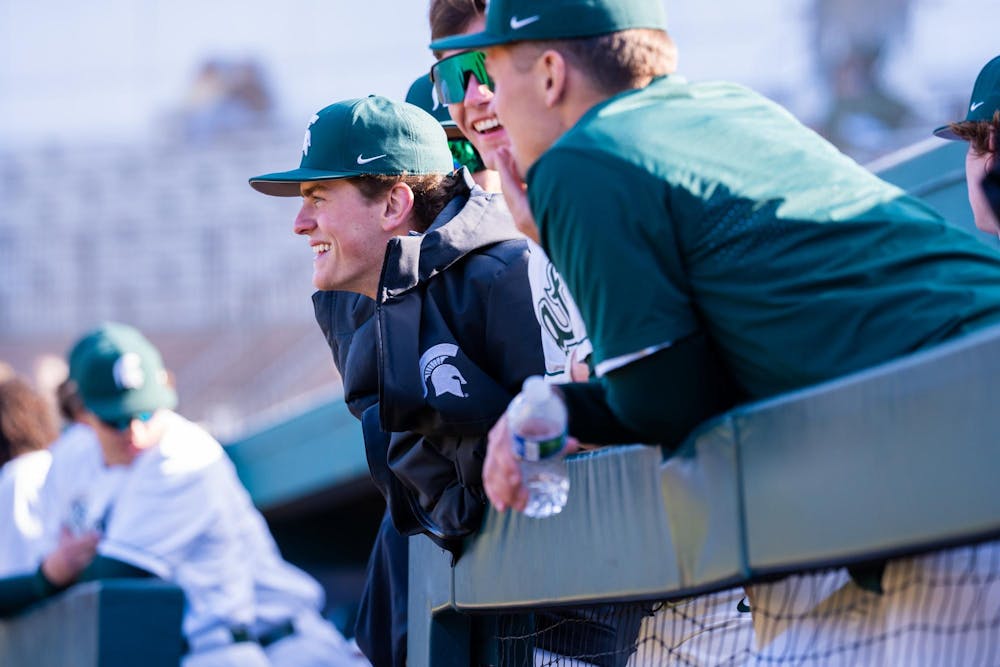 <p>MSU baseball players share a laugh between innings during the team’s home opener vs. the University of Evansville at McLane Baseball Stadium on March 15, 2024.</p>