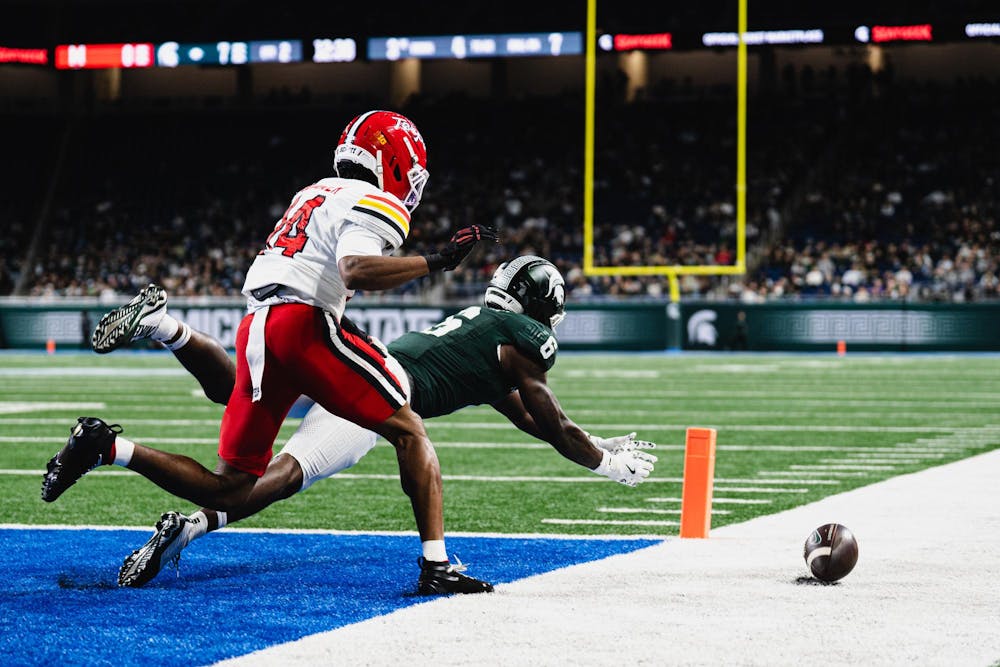 <p>MSU sophomore wide receiver Nick Marsh (6) fumbles the ball versus Maryland at the Ford Field Stadium in Detroit, MI, on Nov. 29, 2025.</p>