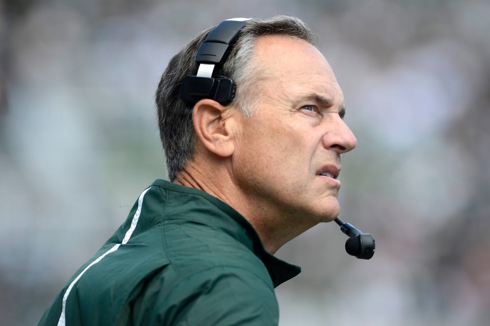 <p>Head coach Mark Dantonio watches from the sidelines in the second quarter during a game against Air Force on Sept. 19, 2015, at Spartan Stadium. The Spartans defeated the Falcons, 35-21. Julia Nagy/The State News</p>