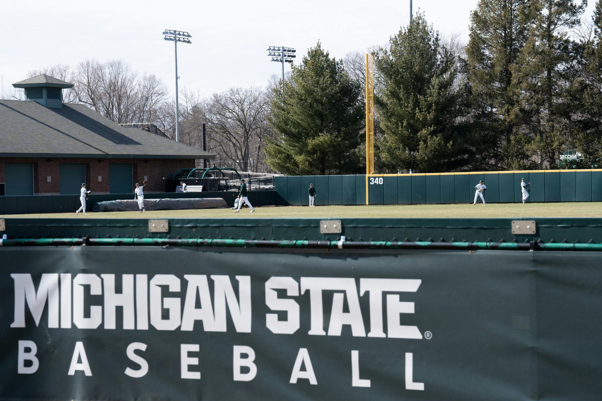 Michigan State men’s baseball warms up for a game against Bowling Green University on Kobs Field at McLane Stadium on March 29, 2022. The Spartans lost to the Falcons with a score of 12 to 3.