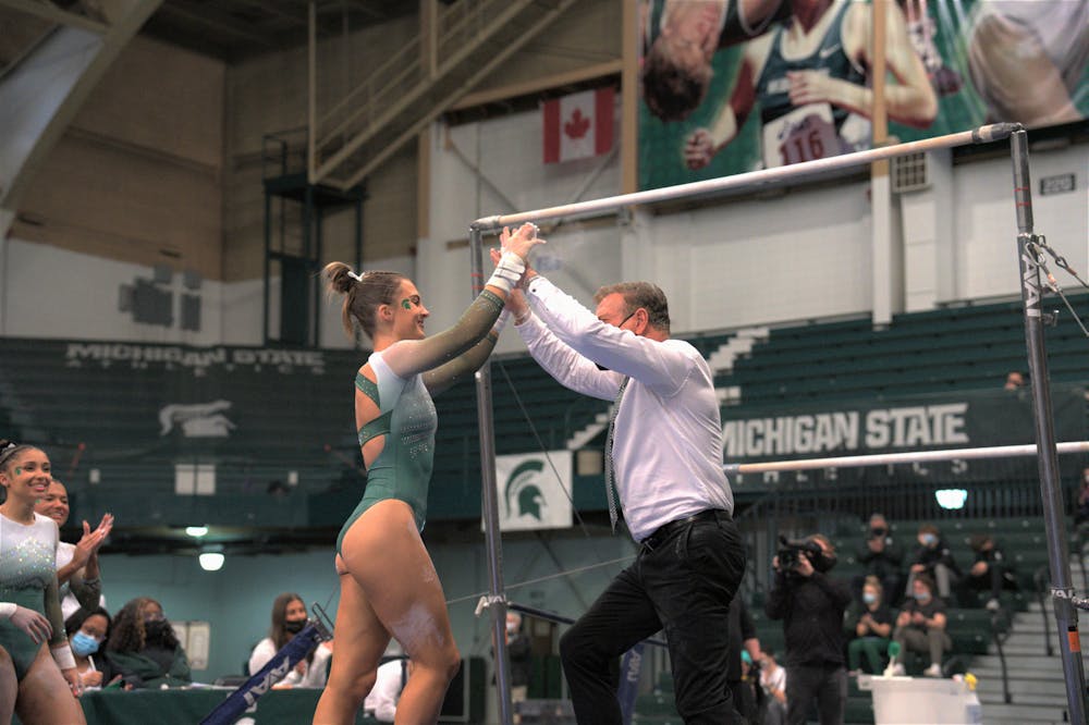 MSU gymnastics breaks program score record versus Illinois - The State News