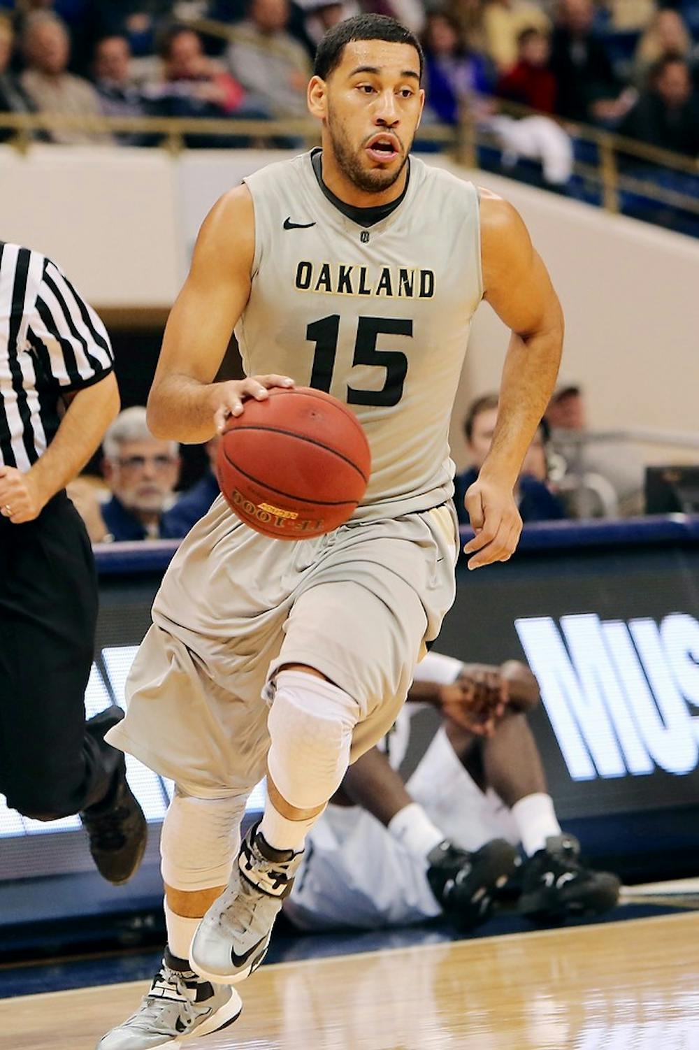 	<p>Oakland senior forward Drew Valentine dribbles the ball up the court. Valentine is set to play his brother, Denzel, on Friday.</p>