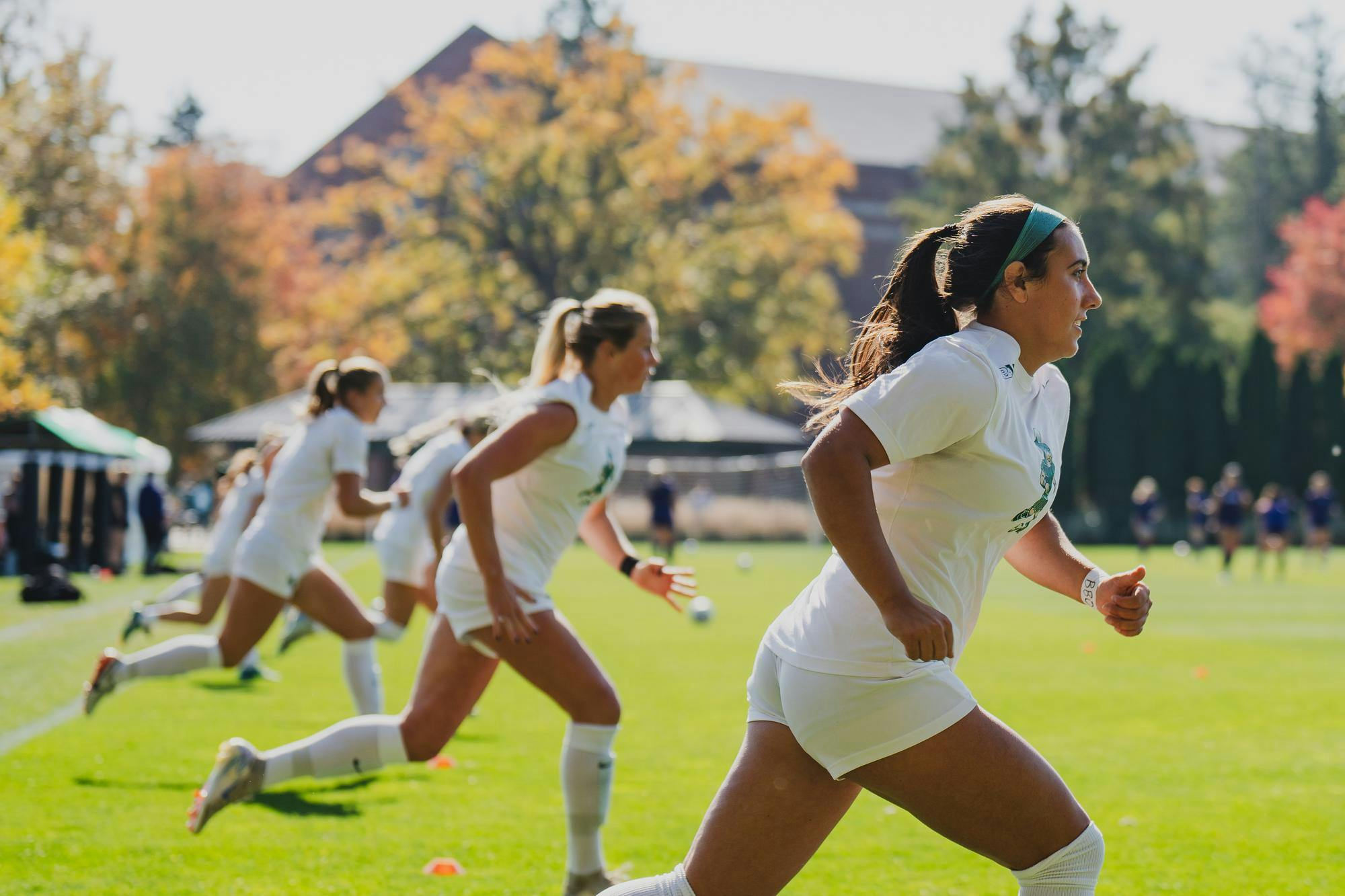 <p>MSU women's soccer players warm up at DeMartin stadium ahead of a game against Northwestern on Oct. 20, 2024.</p>