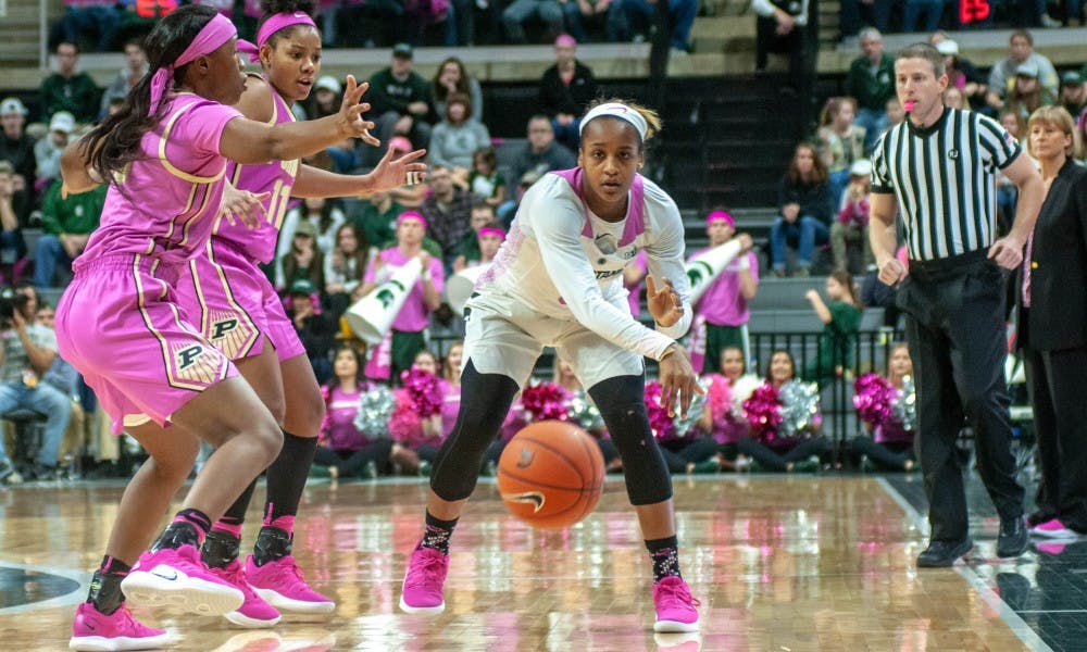 Redshirt-junior guard Shay Colley (0) passes the ball during the women’s basketball game against Purdue at Breslin Center on Feb. 3, 2019. The Spartans lead the Boilmakers at halftime 39-26.