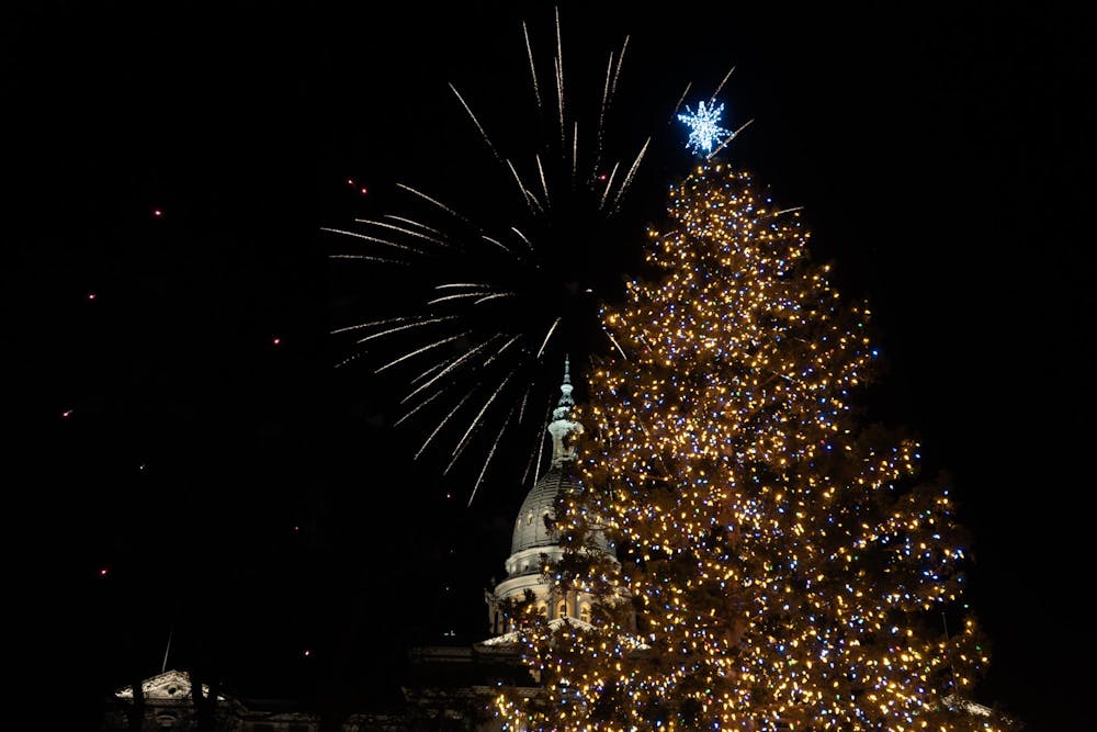 A firework show followed the tree lighting at the Lansing Silver Bells event at the Michigan State Capitol on Nov. 17, 2023. 